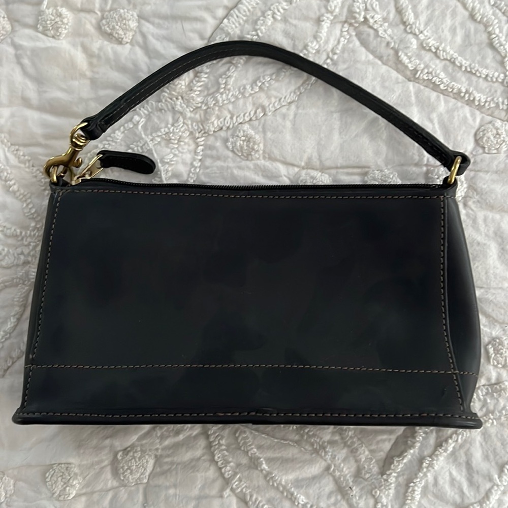 Black leather Coach wristlet.